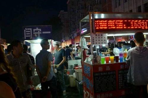 哈尔滨夜市爆料视频播放,灯火辉煌，美食狂欢现场直击